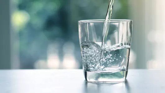 water being poured into a glass