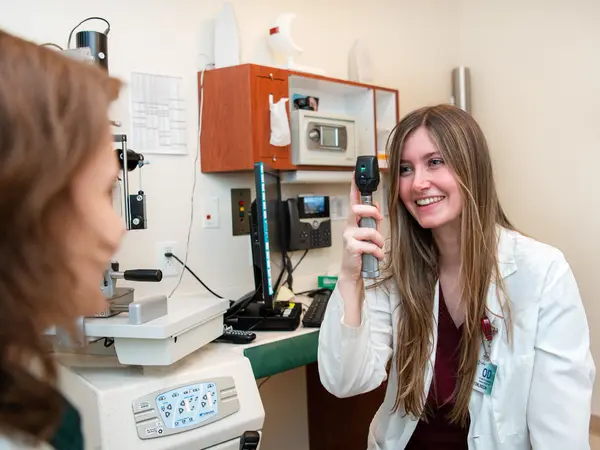 optometrist-giving-patient-exam