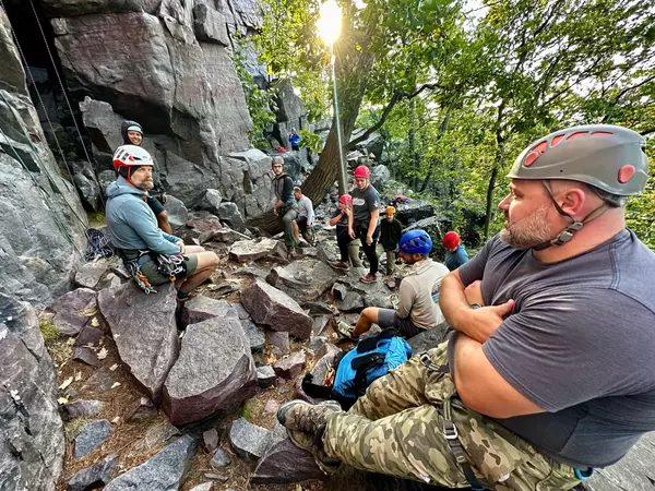 Team rock climbing at the EMPA Wilderness Medicine Conference.
