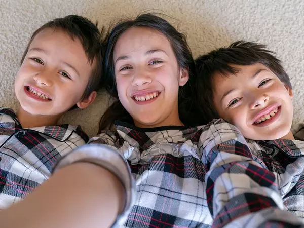 three-kids-smiling