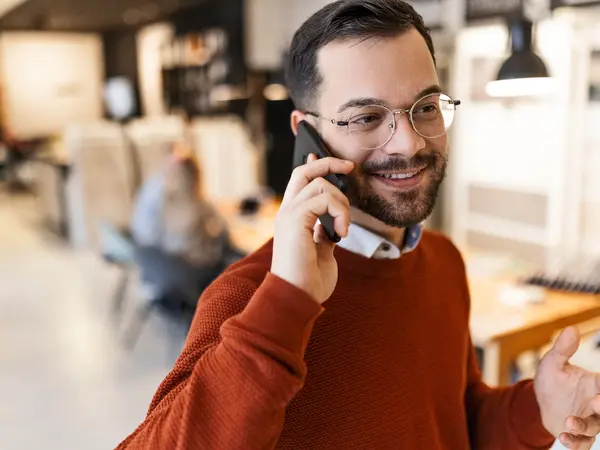 Smiling patient using a smart phone