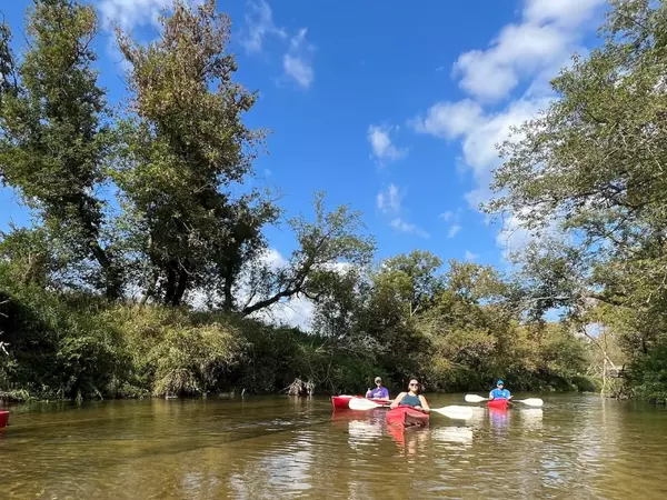 Residents kayaking the Kickapoo river.