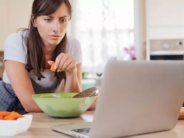 Woman looking up recipes online