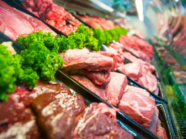Red meat in grocery display case