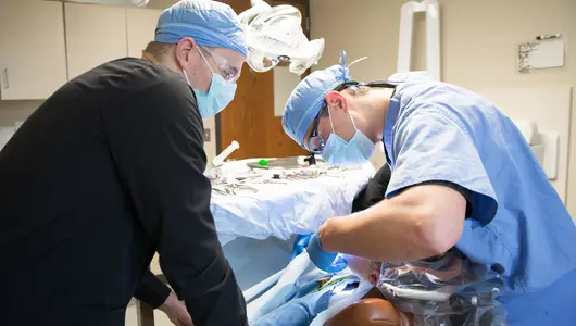 oral-surgery-resident-performing-procedure
