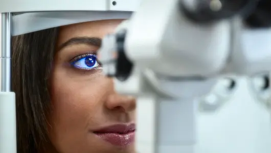 Young woman recieving eye exam