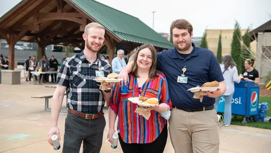 three-colleagues-at-healthcare-week-picnic