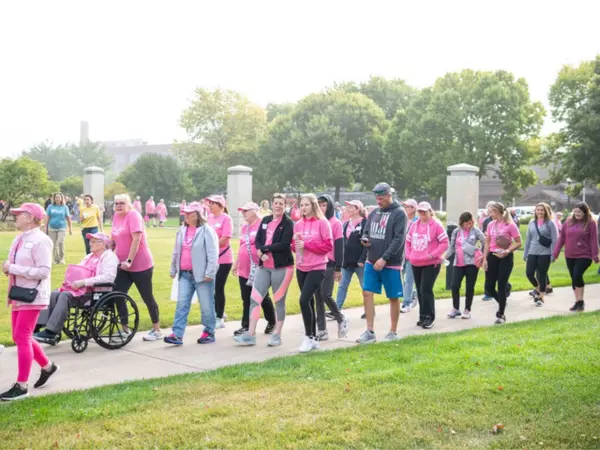 Walkers dressed in pink at Steppin' Out in Pink fundraising walk.